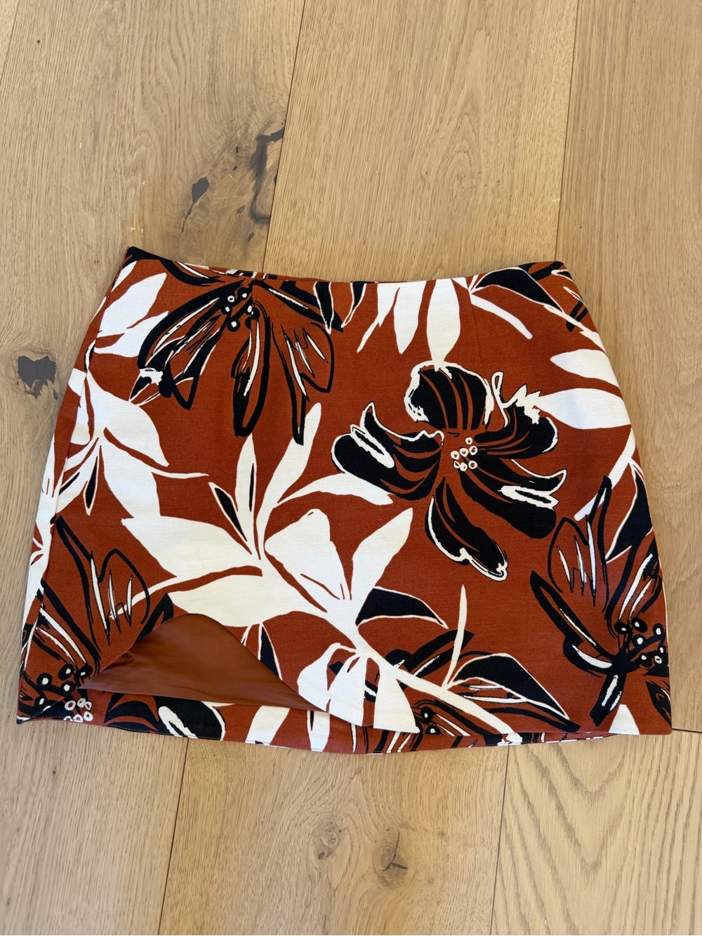 Shona Joy Rust Floral Mini Skirt with Black and White Bloom